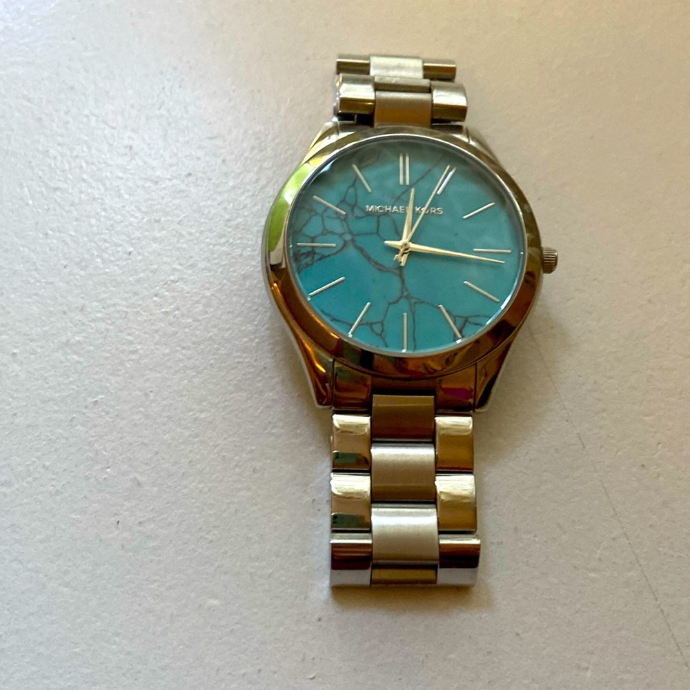 MK women’s turquoise watch